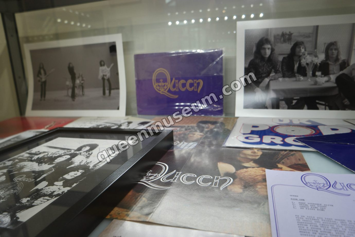 US promo edition, UK test pressing, and press photographs from EMI's 1973 launch of Queen