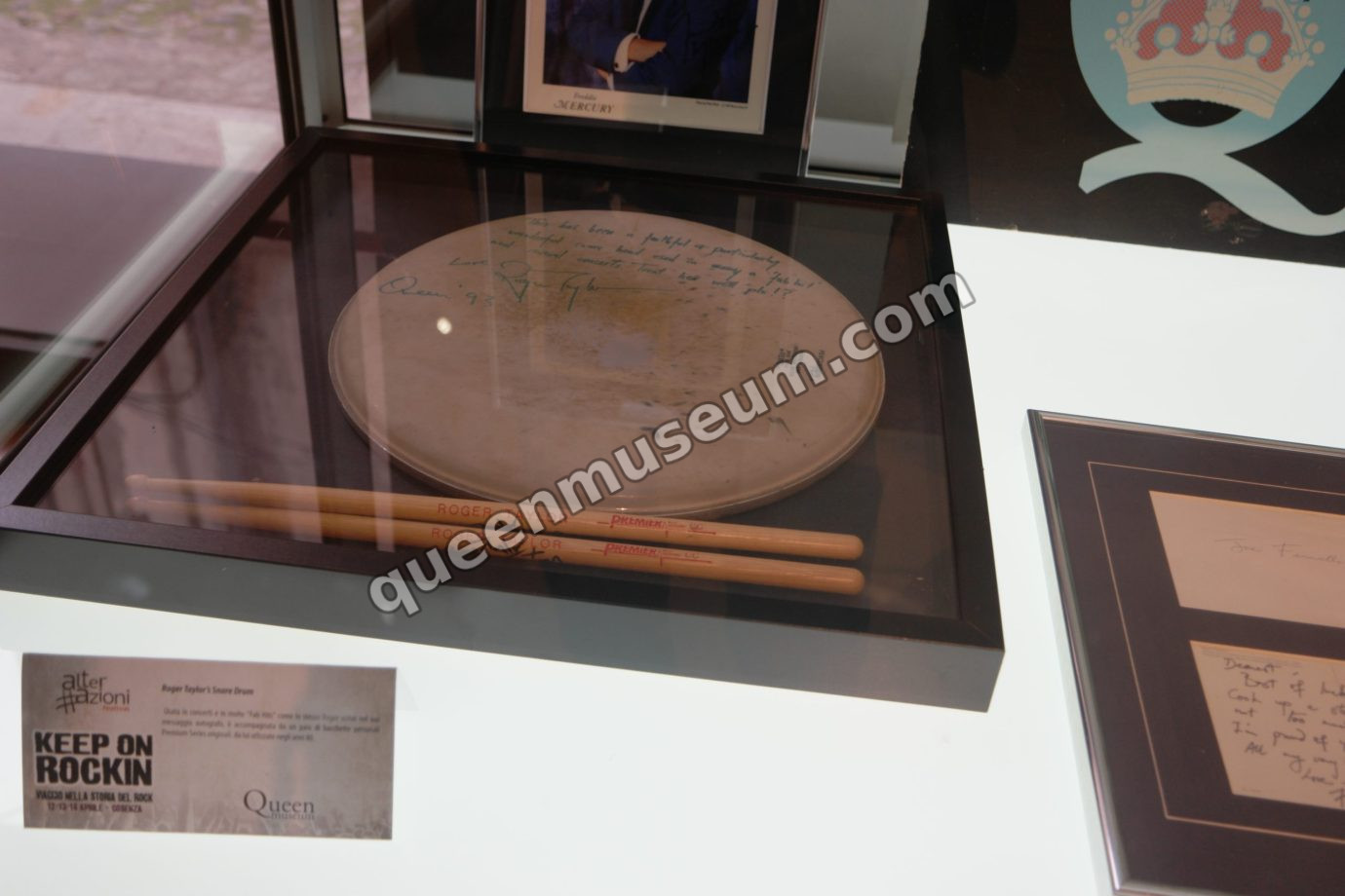 Roger Taylor’s signed snare drum and drumsticks, exhibition display