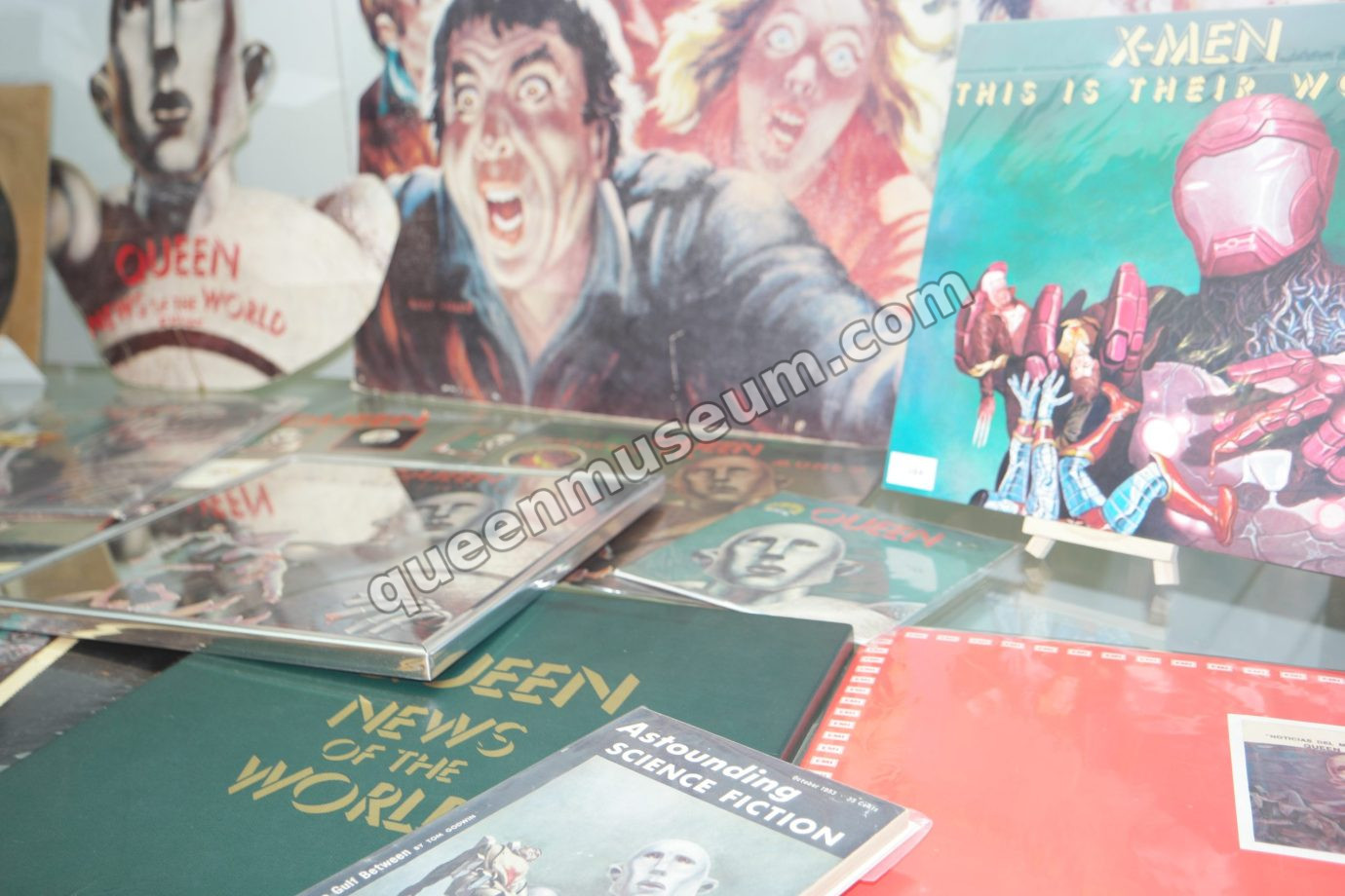 News of the World cardboard promotional box alongside the Astounding Science Fiction pulp magazine that inspired the cover art